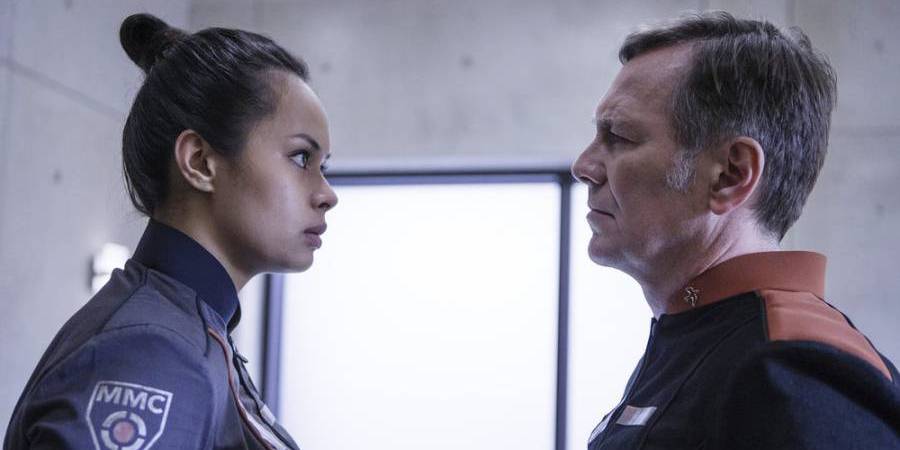 THE EXPANSE -- "Here There Be Dragons" Episode 211 -- Pictured: (l-r) Frankie Adams as Bobbie Draper, Jonathan Whittaker as Sec-Gen Gillis -- (Photo by: Rafy/Syfy)