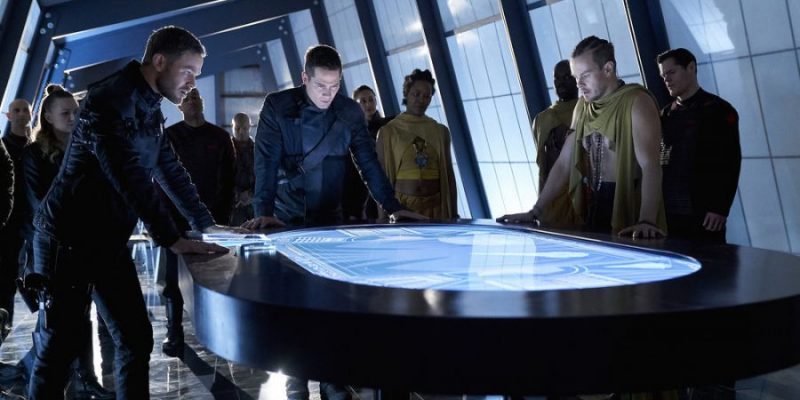 KILLJOYS -- "The Wolf You Feed" Episode 307 -- Pictured:  (l-r) Aaron Ashmore as John, Luke Macfarlane as D'Avin, Morgan Kelly as Alvis -- (Photo by: Steve Wilkie/Killjoys III Productions Limited/Syfy)