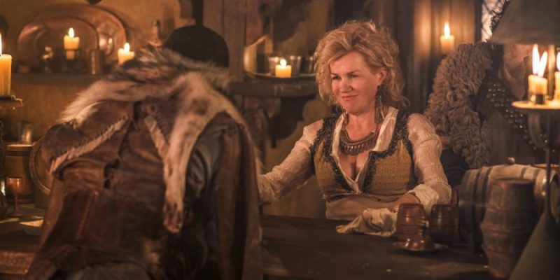 The Outpost -- "This Is One Strange Town" -- Image Number: OUT202_0004bc.jpg -- Pictured (L-R): Aaron Fontaine as Tobin and Robyn Malcolm as The Mistress -- Photo: Aleksander Letic/NBCU International -- © 2019 Outpost TV LLC. Courtesy of Electric Entertainment .