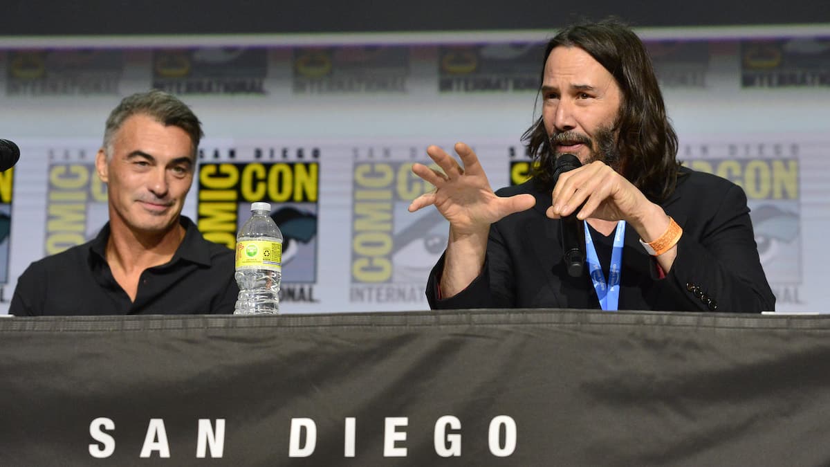 SAN DIEGO, CALIFORNIA - JULY 22: (L-R) Chad Stahelski and Keanu Reeves speak onstage during "Collider": Directors On Directing Panel At Comic-Con at San Diego Convention Center on July 22, 2022 in San Diego, California. (Photo by Jerod Harris/Getty Images for Lionsgate)